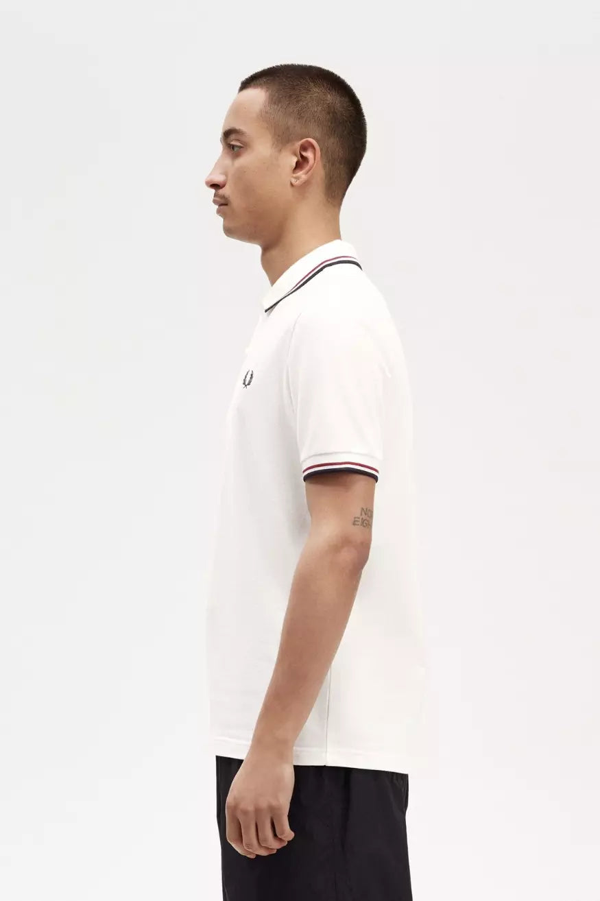 Fred Perry Polo Hombre Blanco Ribetes Rojos y Azules Who killed Bambi?