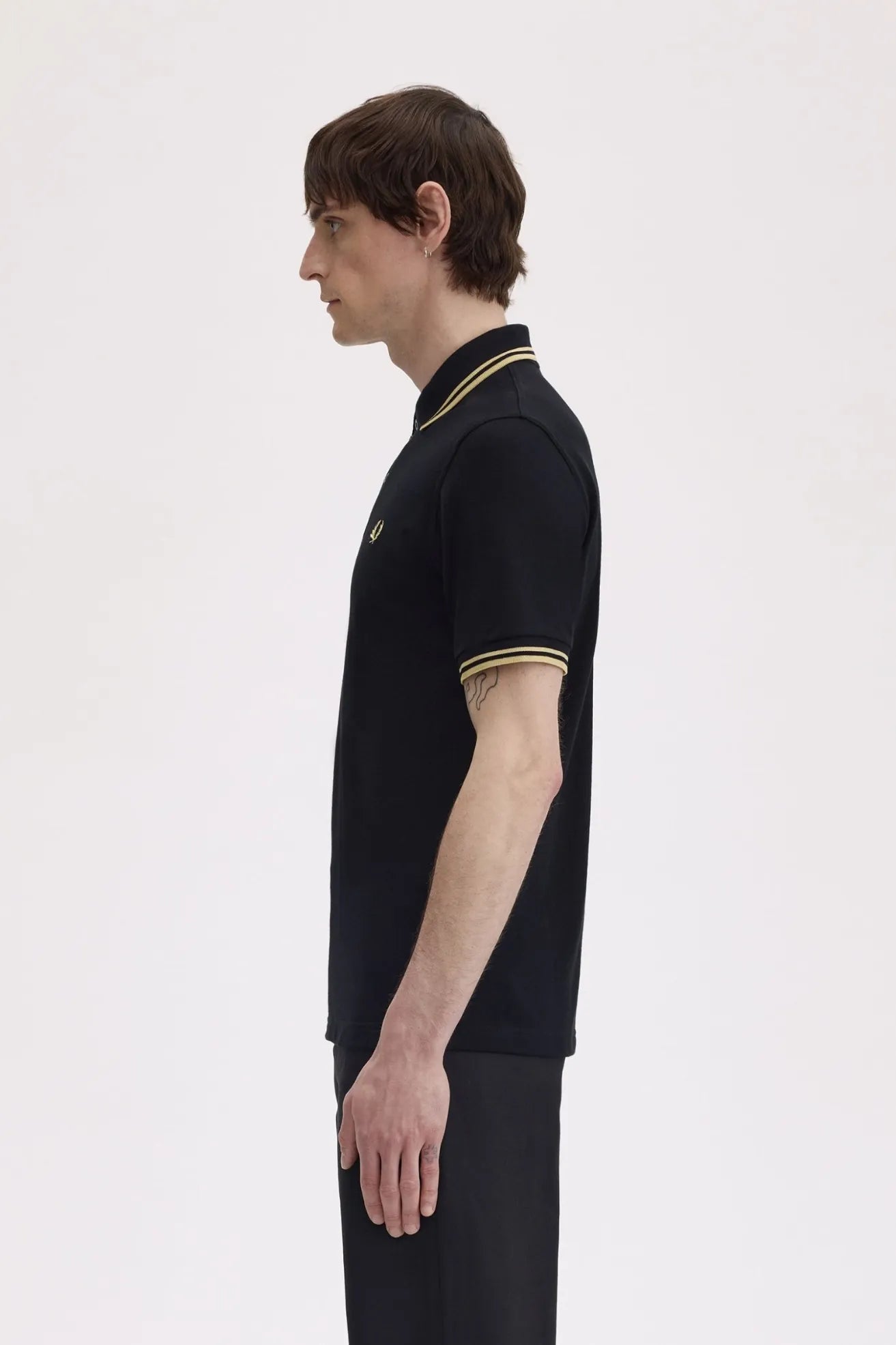 Fred Perry Polo Hombre Made In England M12 Negro Champagne Who killed Bambi?