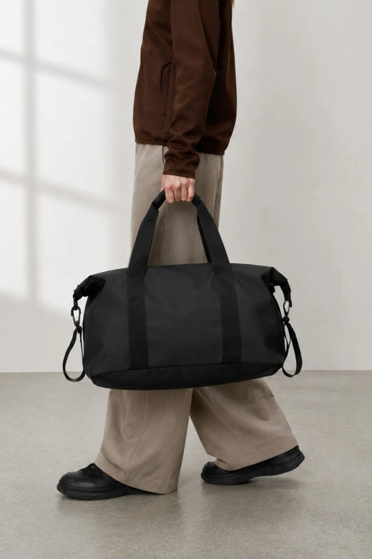 Rains Hilo Weekend Bag Small Negra Who killed Bambi?